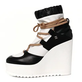 CHANEL RUNWAY WEDGE PLATFORM BOOTS