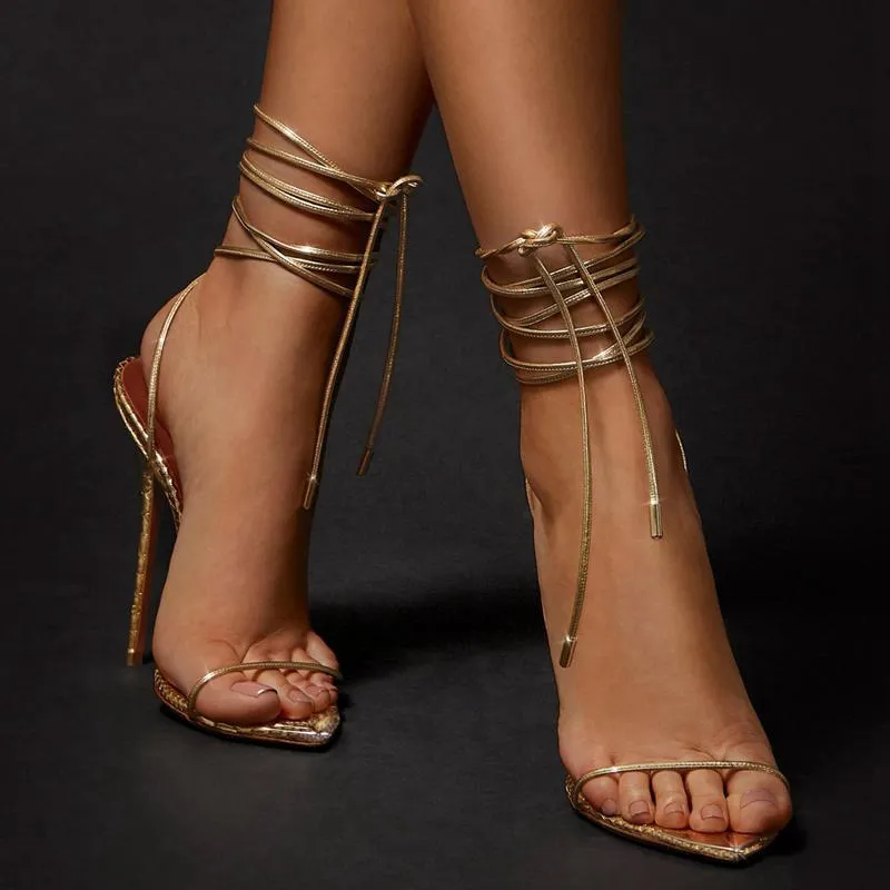 Gold snake strap stiletto sandals